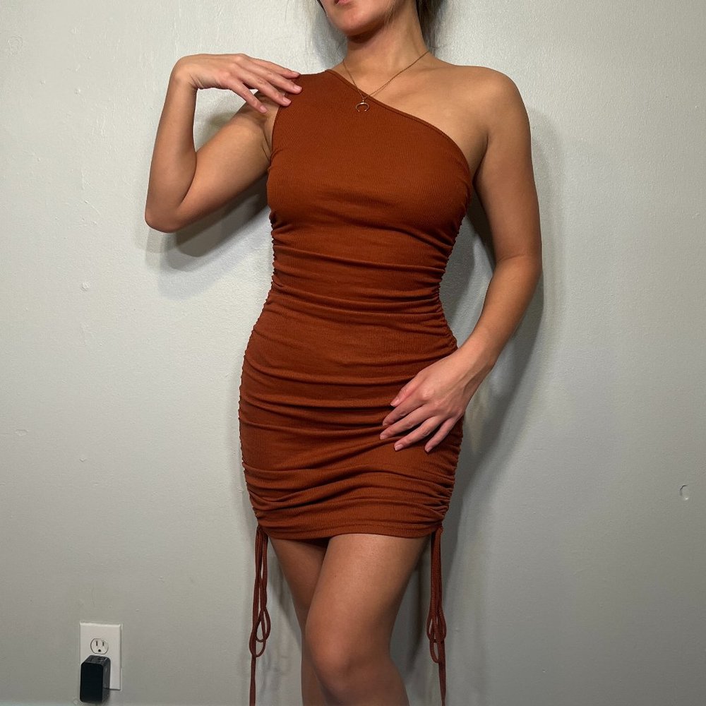 Asymmetric neck rust bodycon dress